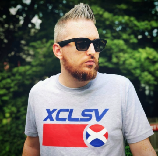 Jay Pluss Wearing Exclusive Apparels XCLSV Shirt